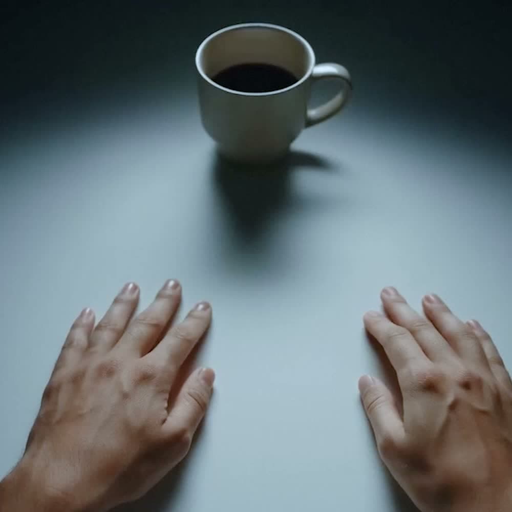 Human first-person hand interaction with a cup